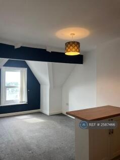 Breakfast Bar And Living Area 