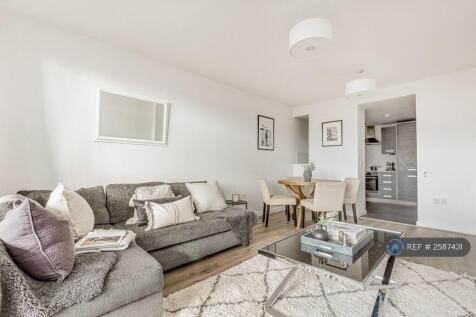 Living & Dining Room With Sunset Balcony Views
