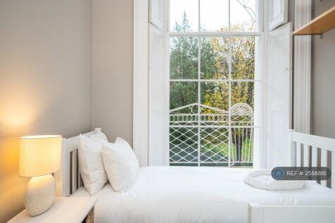 Master Bedroom With Balcony To The Rear