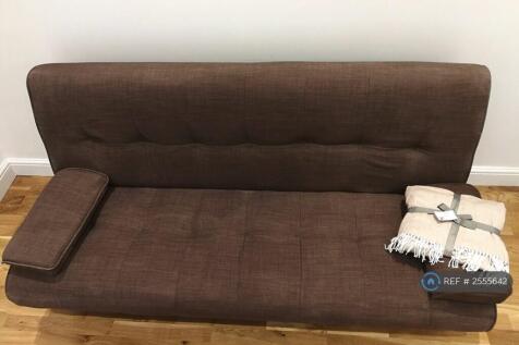 Three Seater Sofa In The Living Room