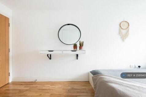 Large Bedroom With a Spacious Built-In Wardrobe