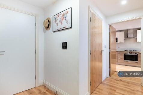 Hallway With Two Storage Rooms