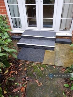 Step Out From Double Doors Into Courtyard