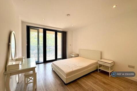 Large Bedroom Leading Out To Balcony