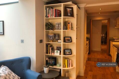 Living Area Leads To Kitchen