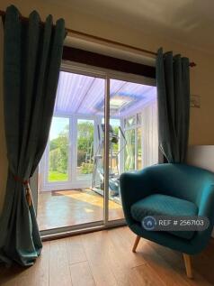 Bedroom 2 And View To The Conservatory And Garden