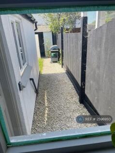 Back Door Leading To Fenced Rear Garden