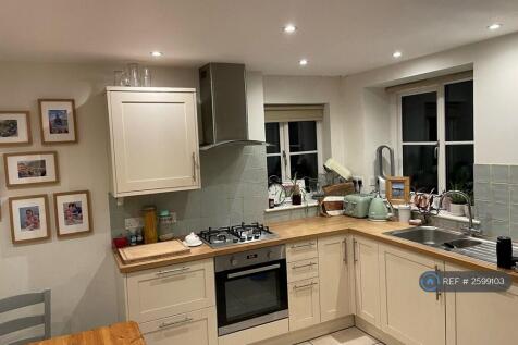 Kitchen With Outlook To Rear Garden