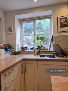 Kitchen With Outlook To Rear Garden