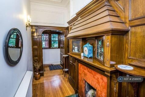Entrance Hall With Fireplace 