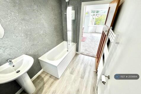 Bathroom With Bath And Overhead Shower