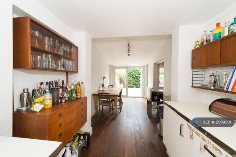 Kitchen Opening Up Onto Dining Room