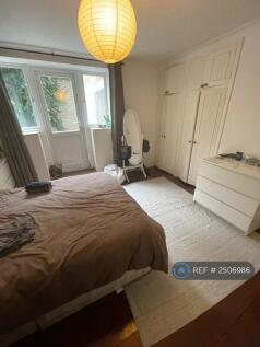 Bedroom/Door Leading To Garden
