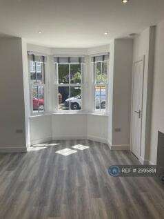 Lounge Bay Window With Fitted Blinds.