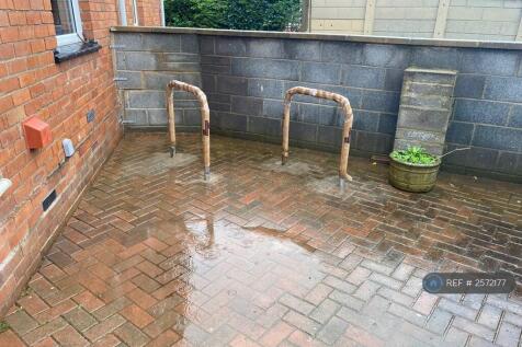 Rear Couryard With Locking Stands For 4 Bikes