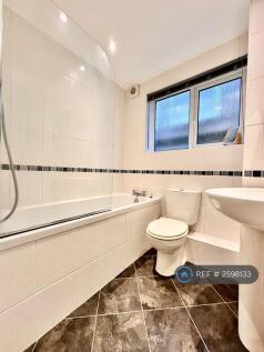 Modern Bathroom With Over Bath Shower