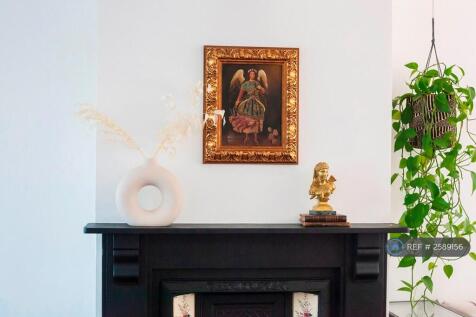 Timeless Charm With Original Fireplace