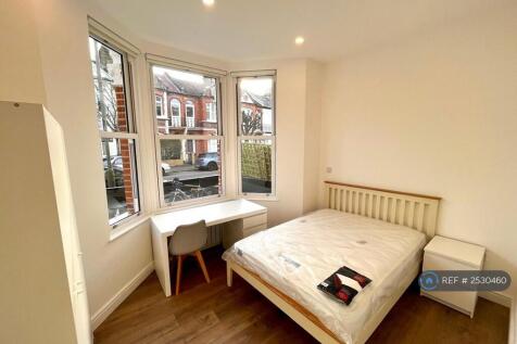 Ensuite Bedroom With High Ceilings