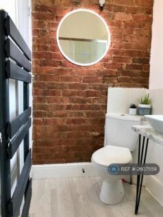 Exposed Brick And Light Up Mirror