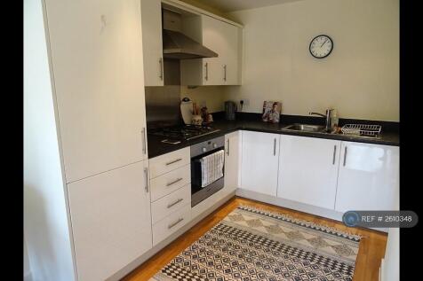 Kitchen With Gas Hob, Fridge And Washing Machine