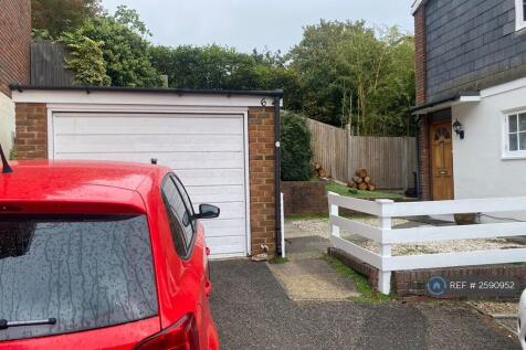 Garage And The Front View Of The House 