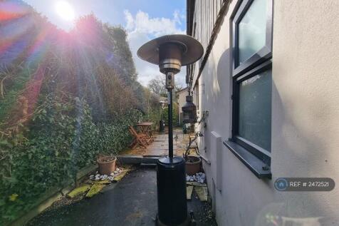 Courtyard Garden: Heater &amp; Table Not Included