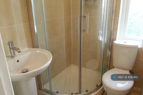 Two  Clean Shower Rooms