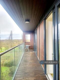 Long Balcony, Open Doors In Living And Bedroom