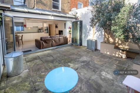 Huge Secluded Patio With Seating And Olive Trees