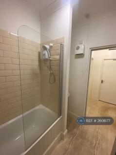Bath With Shower &amp; Glass Panel
