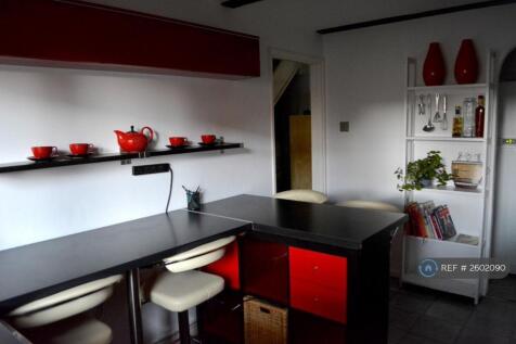 Kitchen With Breakfast Bar And New Appliances