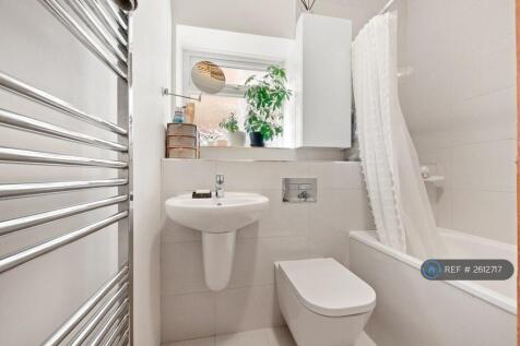 All White Bathroom Fully Tiled Bathroom