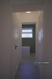 Hallway With Storage Closet