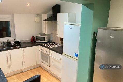Kitchen With 1 Fridge- Freezer And 1 Fridge