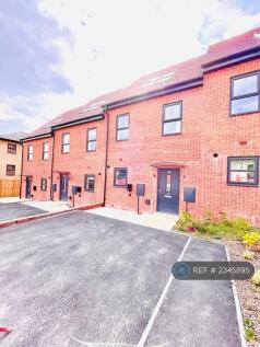Front Of House And Driveway