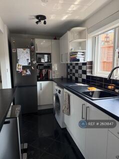 Kitchen With Full Size Fridge