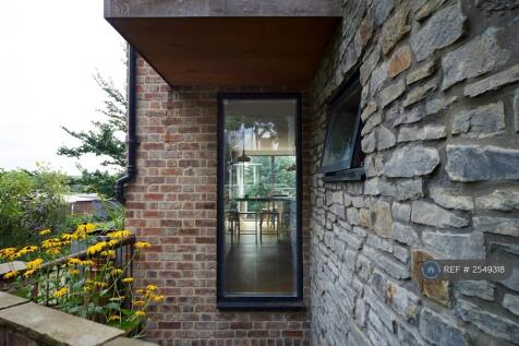 Outside (Looking Into Kitchen)