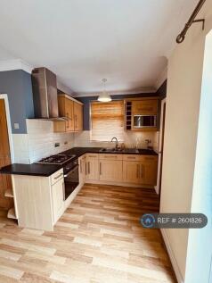 Kitchen With Inbuilt Oven And Microwave