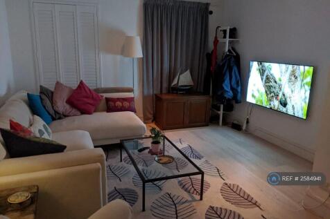 Living Room (Curtain Conceals Front Door) 