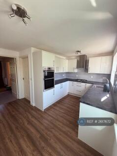 Kitchen With Dining Area