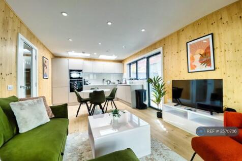 Living Area Looking To Kitchen 