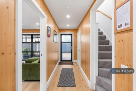 Hallway And Stairs Connecting Upstairs 