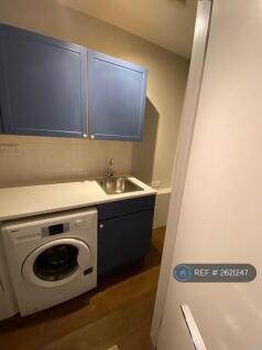 Separate Washroom With Washing Machine And Tumble