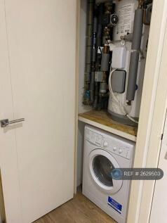 Cabinet With Washing Machine &amp; Heating Unit