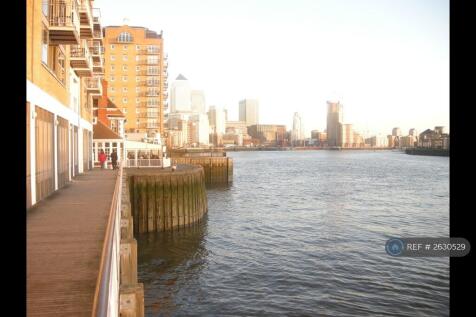 Close Walk To Canary Wharf Along Narrow Street