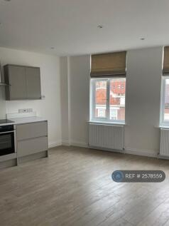 Living Room (Empty) With End Of Kitchen Run
