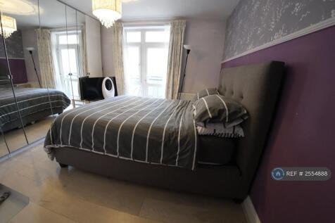 Bedroom With Balcony