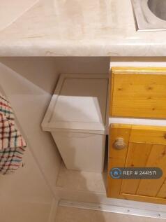 Rubbish Bin And Cupboard Under The Sink 
