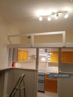 Kitchen Area Below The Mezzanine Platform