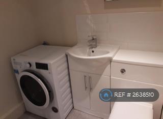 Bathroom With Washing Machine